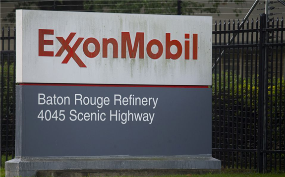 A sign is seen in front of the Exxonmobil Baton Rouge Refinery in Baton Rouge, Louisiana, November 6, 2015. REUTERS/Lee Celano/File Photo
