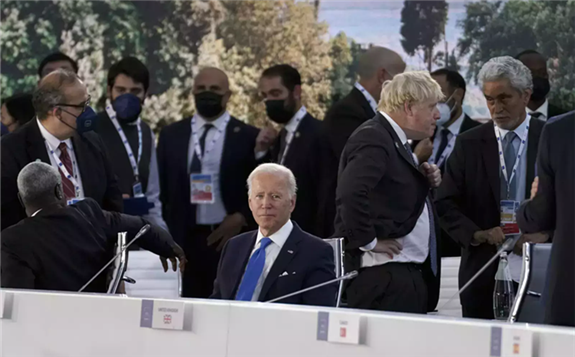 U.S. President Joe Biden, center, looks on ahead of the opening session of the G ..  Read more at: https://energy.economictimes.indiatimes.com/news/renewable/g-20-leaders-tackle-climate-change-as-summit-ends/87431311
