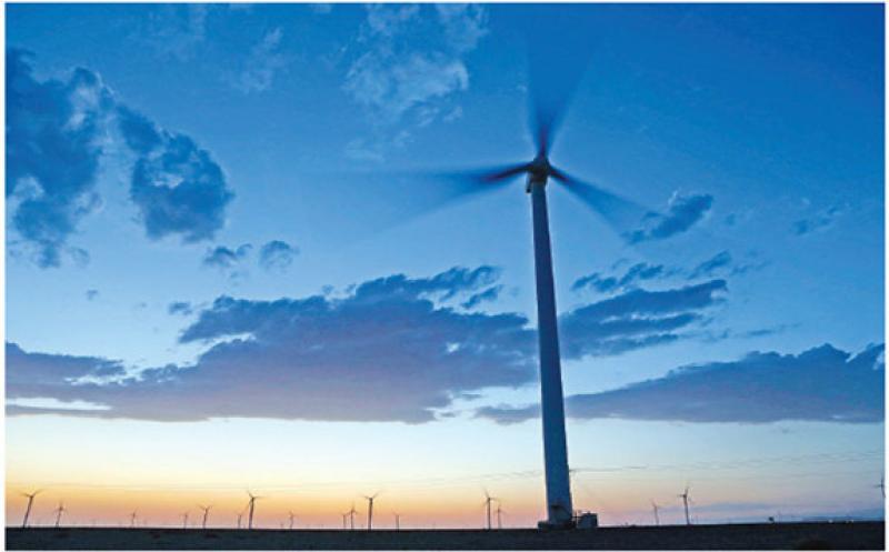 A wind turbine system generates energy in Northwest China's Xinjiang Uygur autonomous region. [Photo/Xinhua]