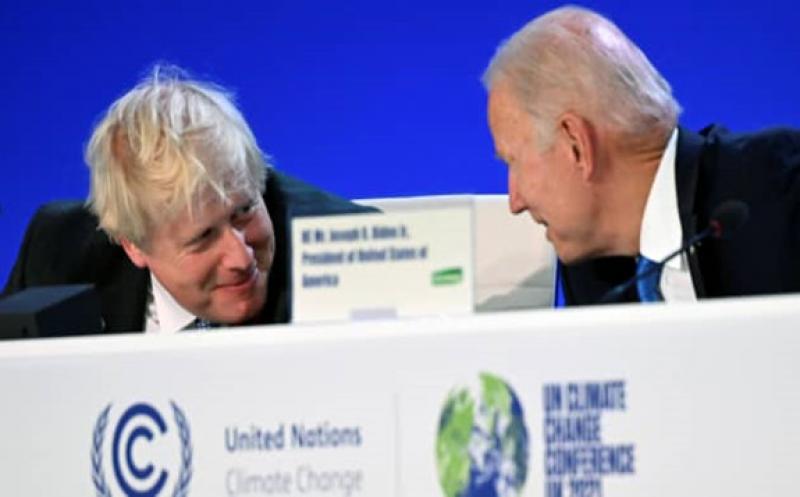 British Prime Minister Boris Johnson and U.S. President Joe Biden react during the “Accelerating Clean Technology Innovation and Deployment” session during the UN Climate Change Conference (COP26) in Glasgow, Scotland, Britain November 2, 2021. Jeff J Mitchell | Reuters