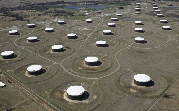 Crude oil storage tanks are seen from above at the Cushing oil hub, in Cushing, Oklahoma, March 24, 2016. REUTERS/Nick Oxford