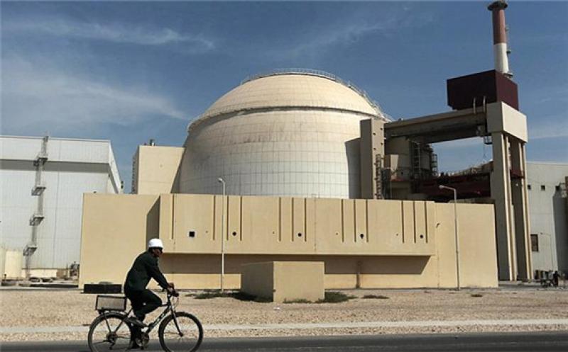 FILE - A worker rides a bicycle in front of the reactor building of the Bushehr nuclear power plant, just outside the southern city of Bushehr, Iran, Oct. 26, 2010.   -   Copyright  AP Photo/Mehr News Agency, Majid Asgaripour, file