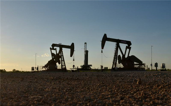 Oil pump jacks in Texas. The International Energy Agency expects production in the US, Canada and Brazil to hit its highest annual level next year. Reuters