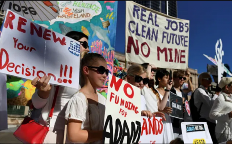 A protest in Brisbane in 2017 against the Carmichael coal mine. The project has provoked opposition in Australia and globally since it began in 2010 © Dan Peled/AP