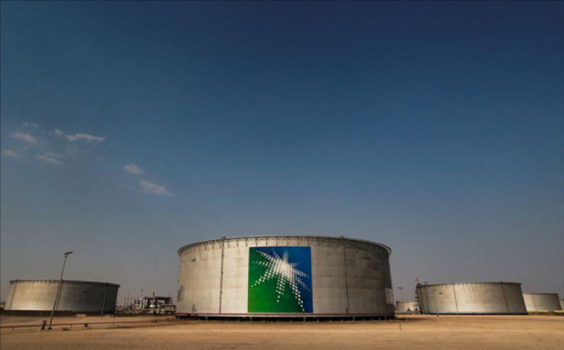 FILE PHOTO: A view shows branded oil tanks at Saudi Aramco oil facility in Abqaiq, Saudi Arabia October 12, 2019. REUTERS/Maxim Shemetov