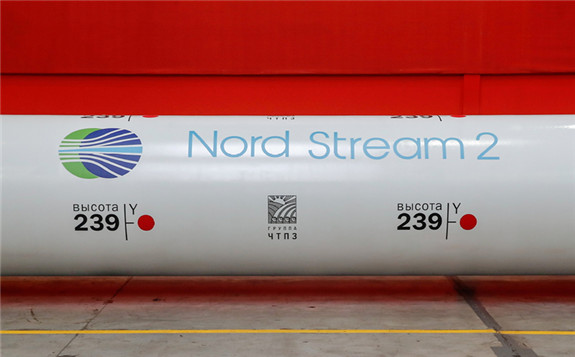 The logo of the Nord Stream 2 gas pipeline project is seen on a large diameter pipe at the Chelyabinsk Pipe Rolling Plant owned by ChelPipe Group in Chelyabinsk, Russia, Feb 26, 2020. [Photo/Agencies]