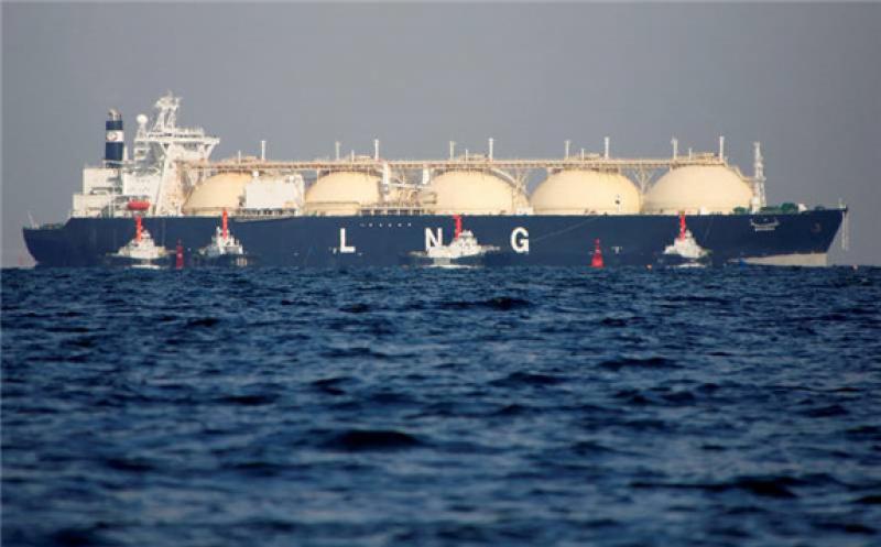 A liquefied natural gas tanker is tugged towards a thermal power station in Futtsu, east of Tokyo. Japan was the world's second largest importer of LNG after China in 2021. Reuters