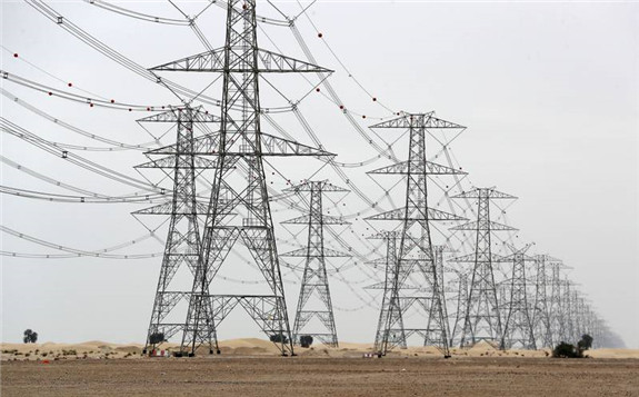 Electricity lines in Dubai. Last year, Dewa opened 16 substations to cope with the rise in demand for electricity. Pawan Singh / The National